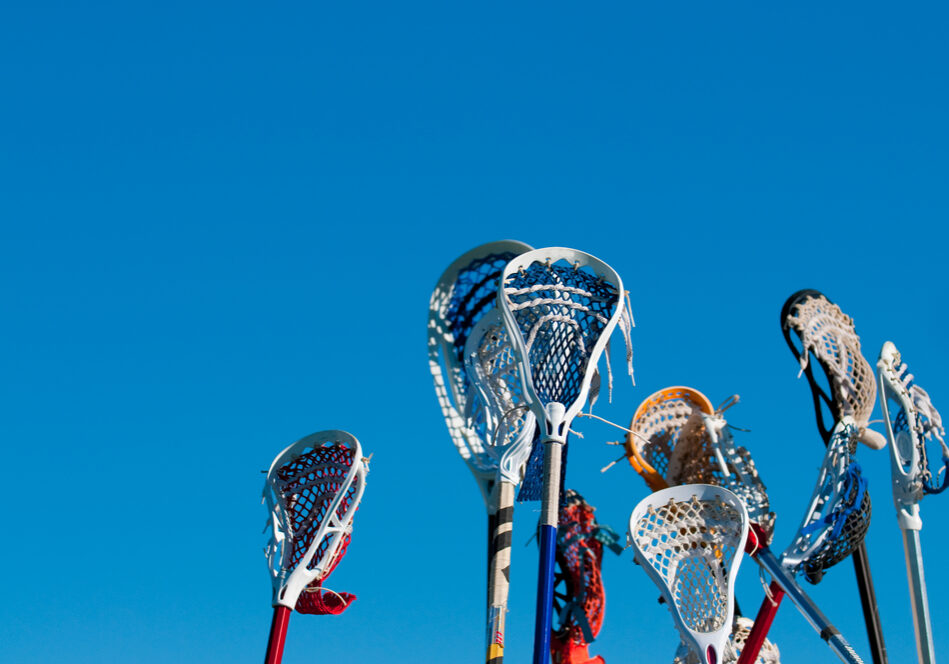 Lacrosse Sticks In Air